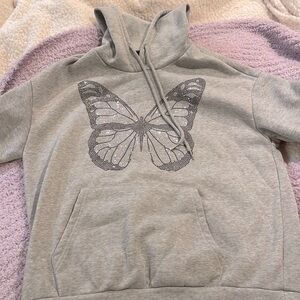 Grey hoodie with butterfly design